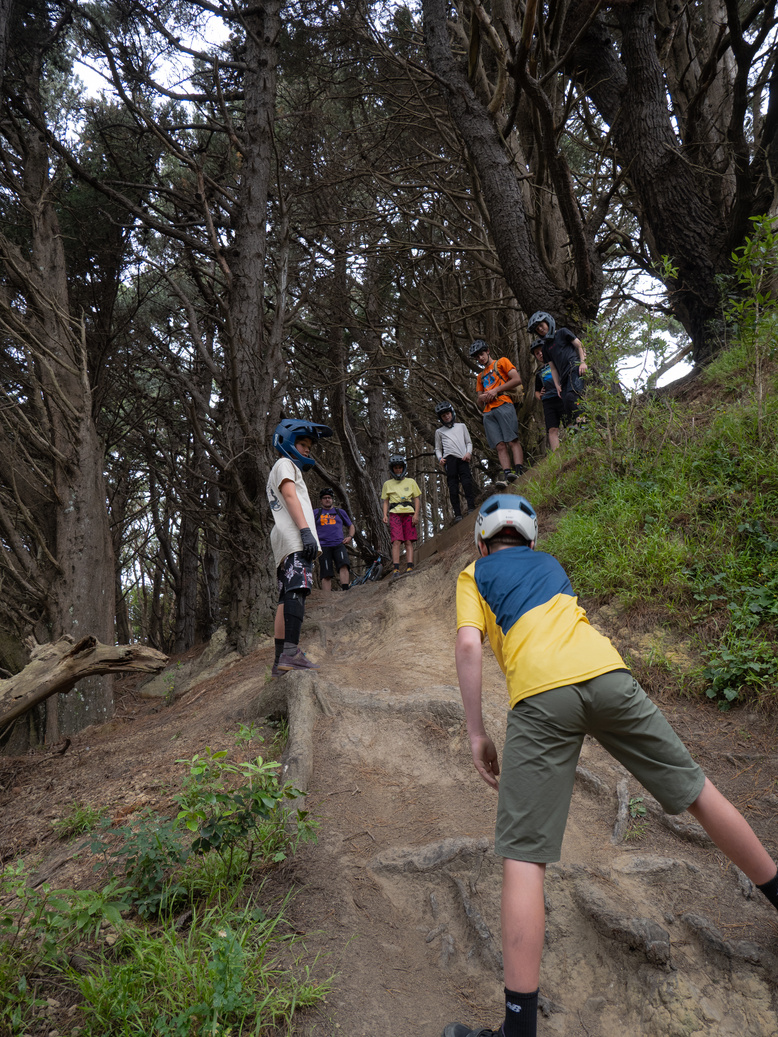 Young riders climbing a Wellington trail