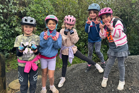 WORD riders in helmets ready to roll