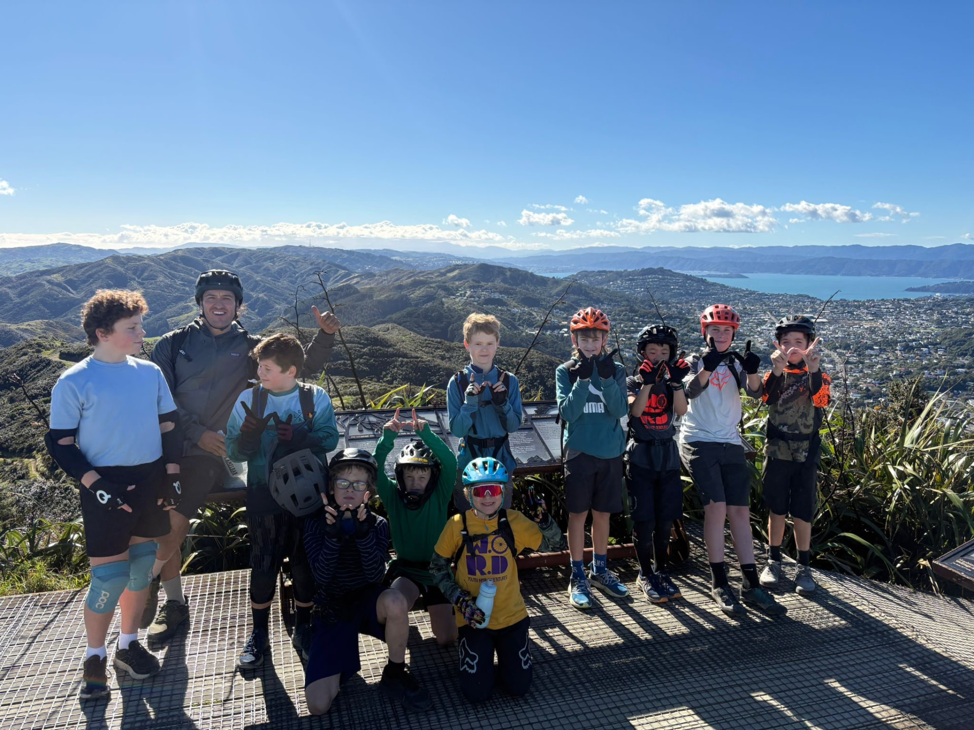 WORD riders at a lookout above Wellington